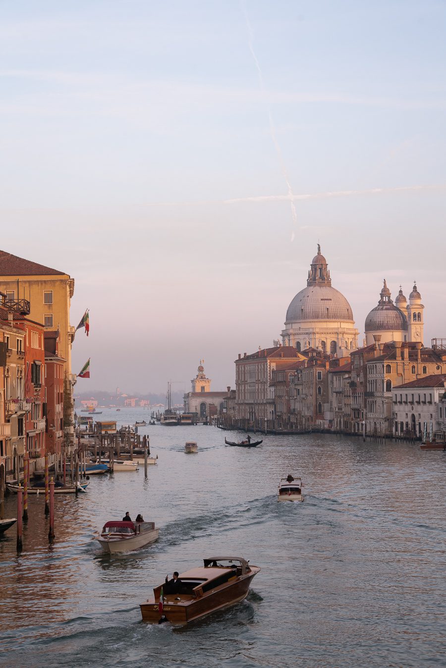 view from the academia bridge in venice italy at sunset