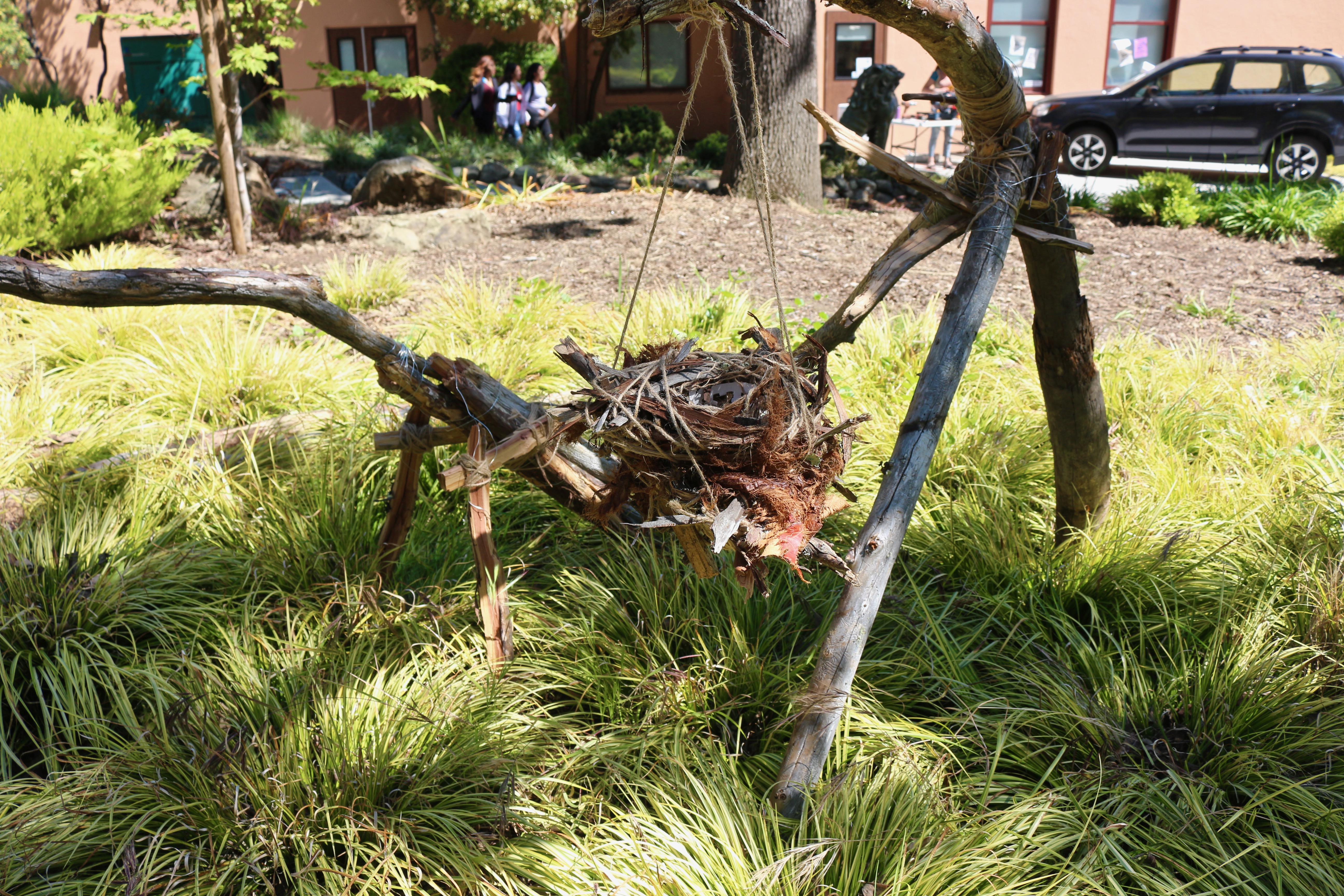 Sculpture by high school artist responding to art prompt with found materials from nature