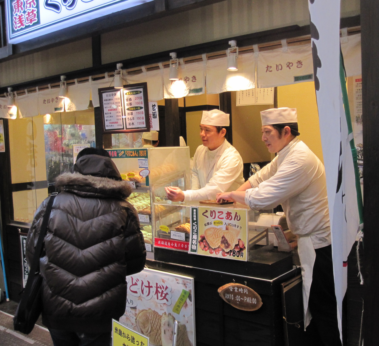 These guys were selling pancakes shaped like fish wrapped in all sorts of things like chocolate, fruit, and sushi. We tried the chocolate covered pancakes. Not too bad.