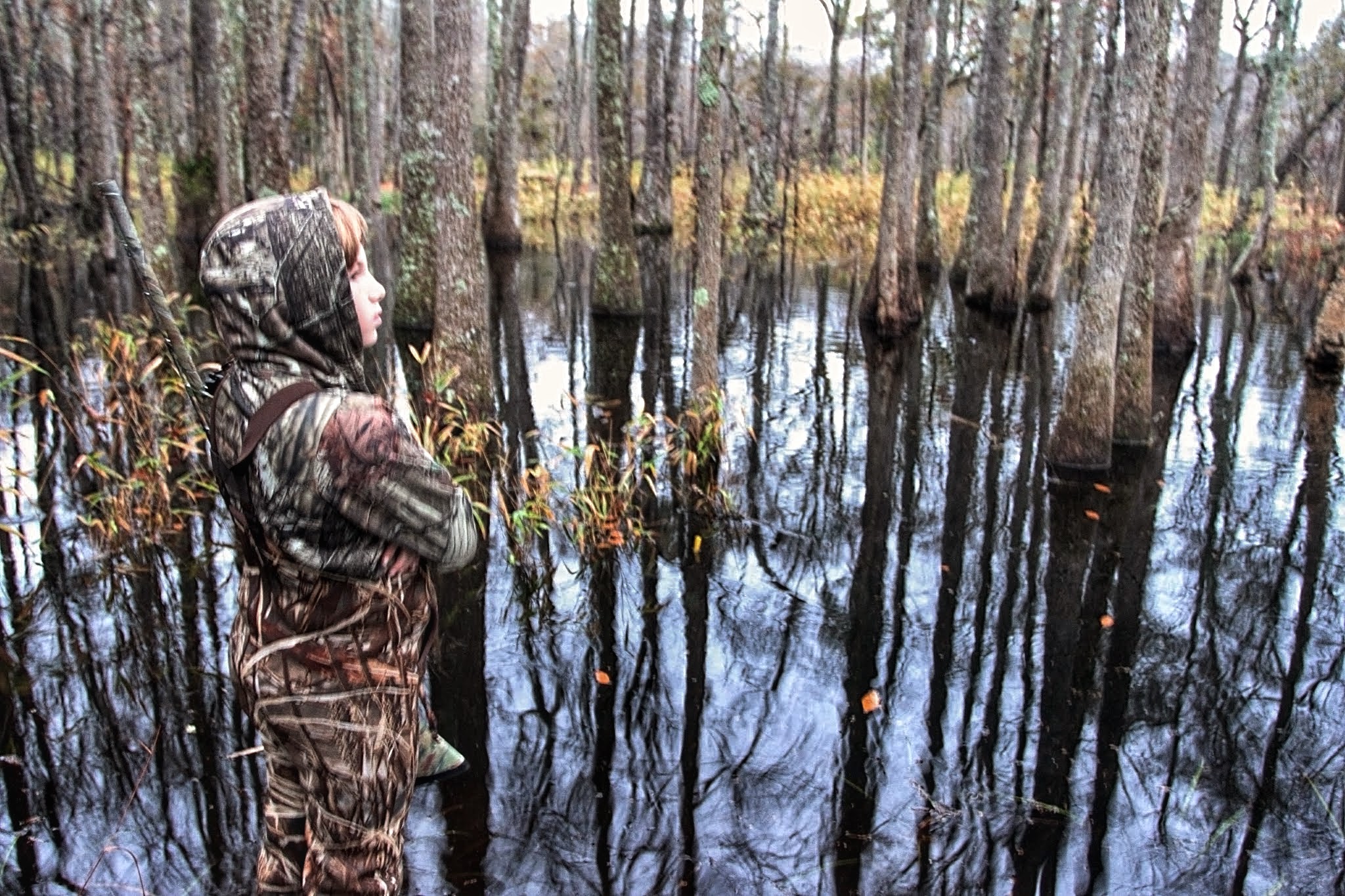 Waiting for wood ducks in the swamp.