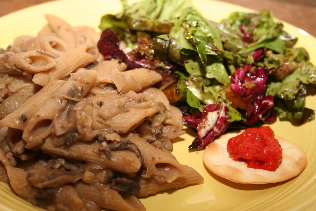 Penne and salad up close