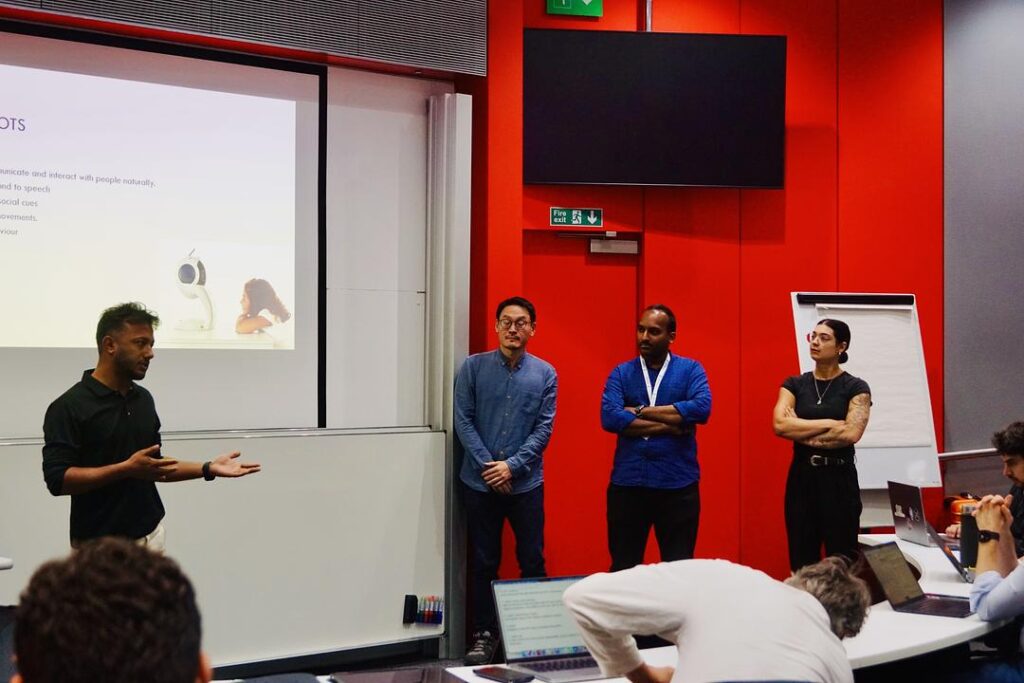 What does it take for a robot to hold a conversation with a room, not just a person?