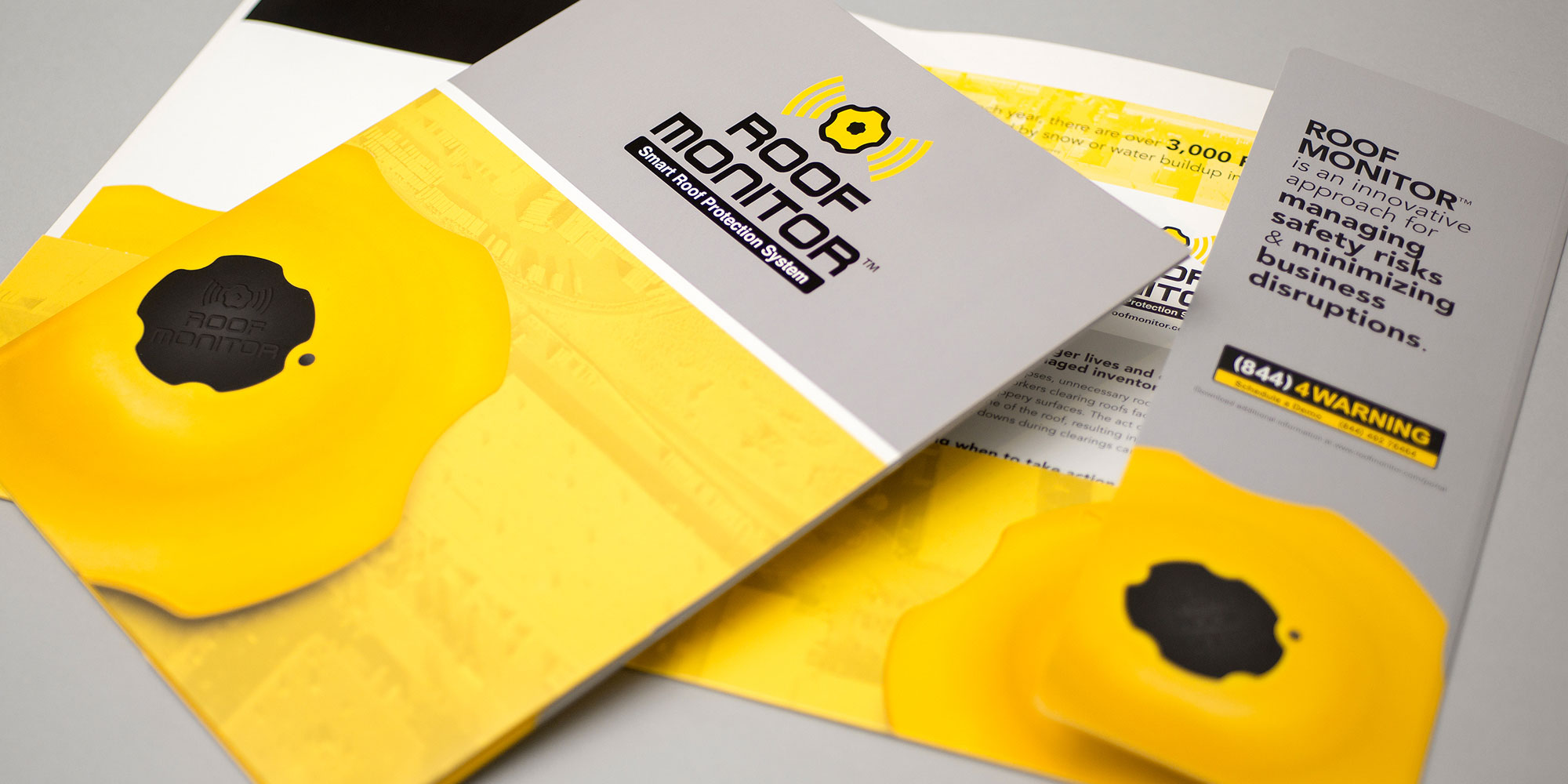 Creative Agency, Robot Creative, provides award winning branding and graphic design concepts to Roof Monitoring
