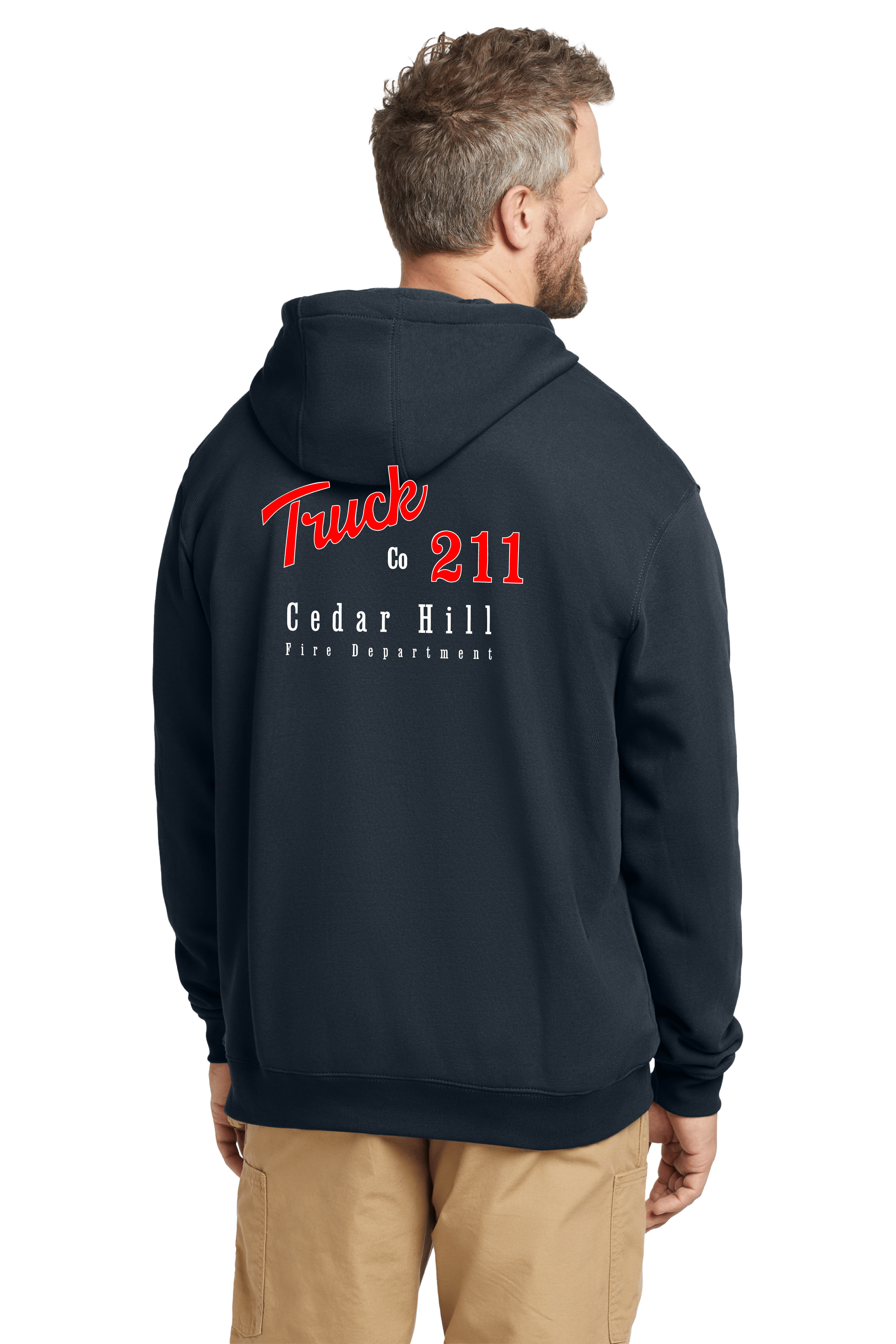 Back view of a man wearing a navy blue hoodie with 'Truck Co. 211' in bold red and white lettering and 'Cedar Hill Fire Department' text underneath.