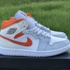 Jordan 1 Mid "Starfish Pure Platinum"