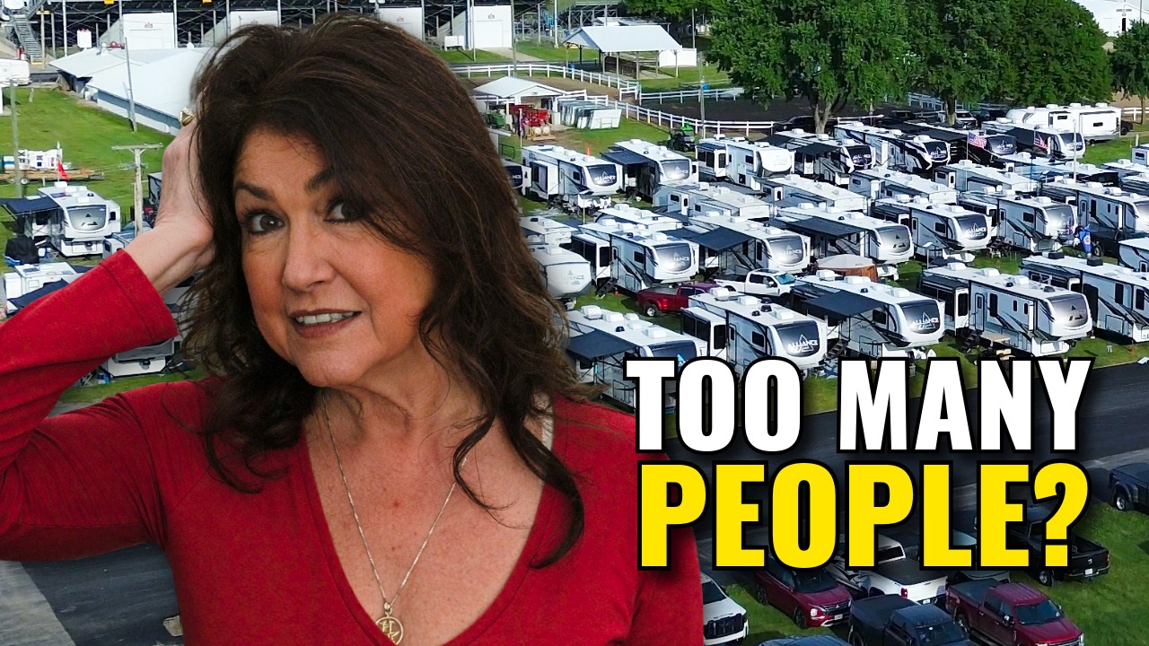 Debi looking overwhelmed in front of 375 rigs at the Alliance RV National Rally in Elkhart, Indiana