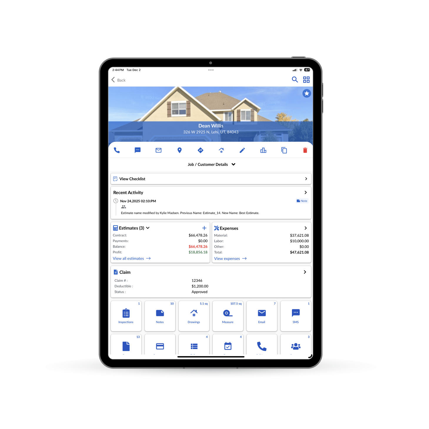 A roofing sales representative using a smartphone to document a final walkthrough and collect payment