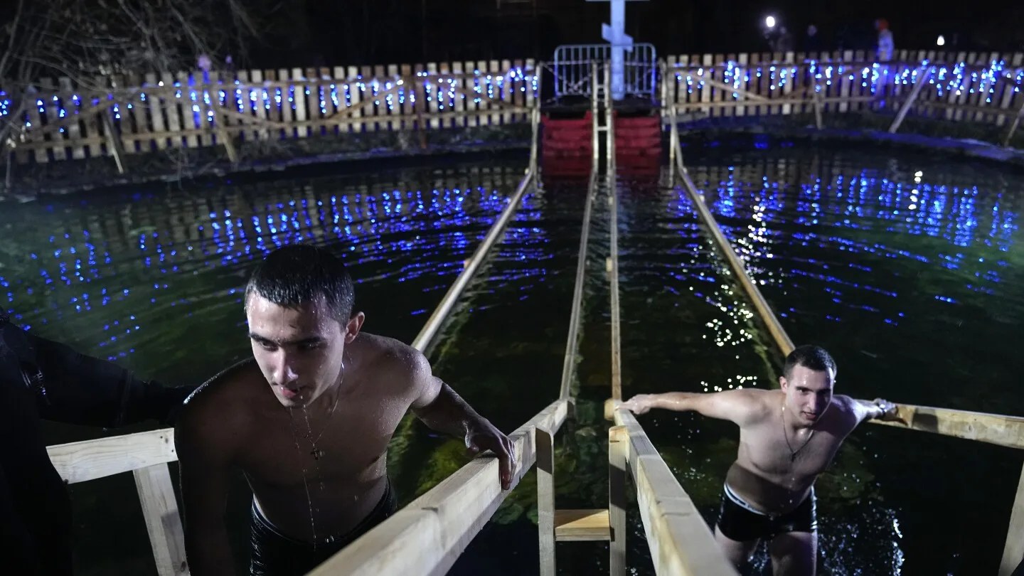 Rising Temperatures Put a Chill on Russia's Orthodox Christians' Epiphany Ice Plunges