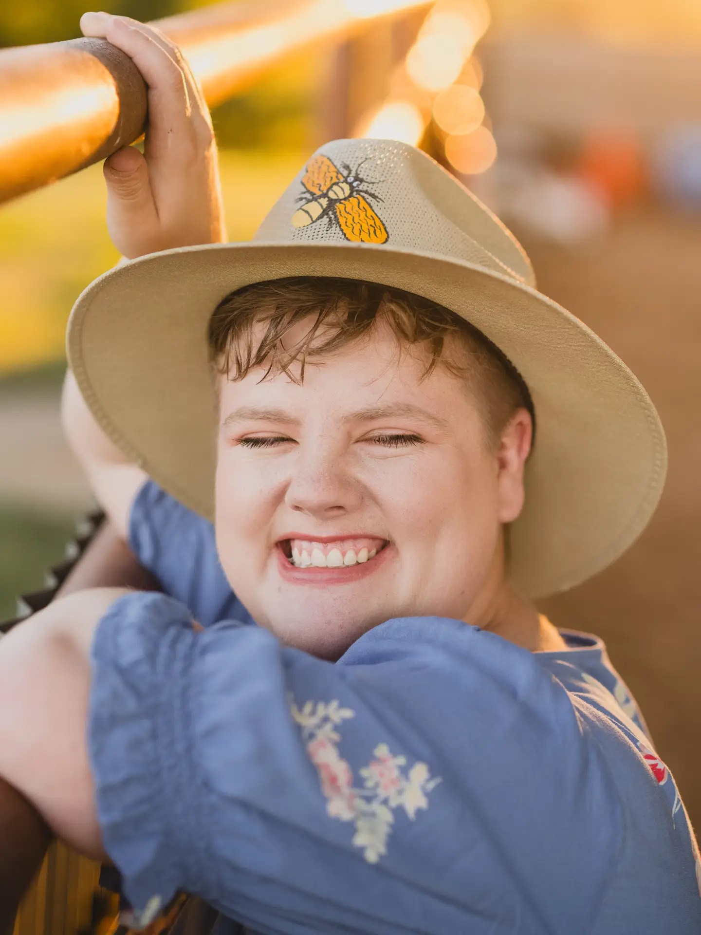 Amara smiling and turning towards the camera