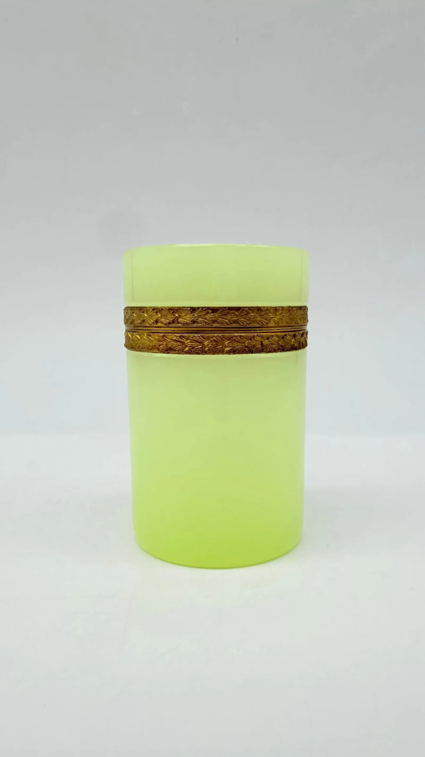 French yellow opaline glass hinged box with ornamented gilt-metal mount, closed front view