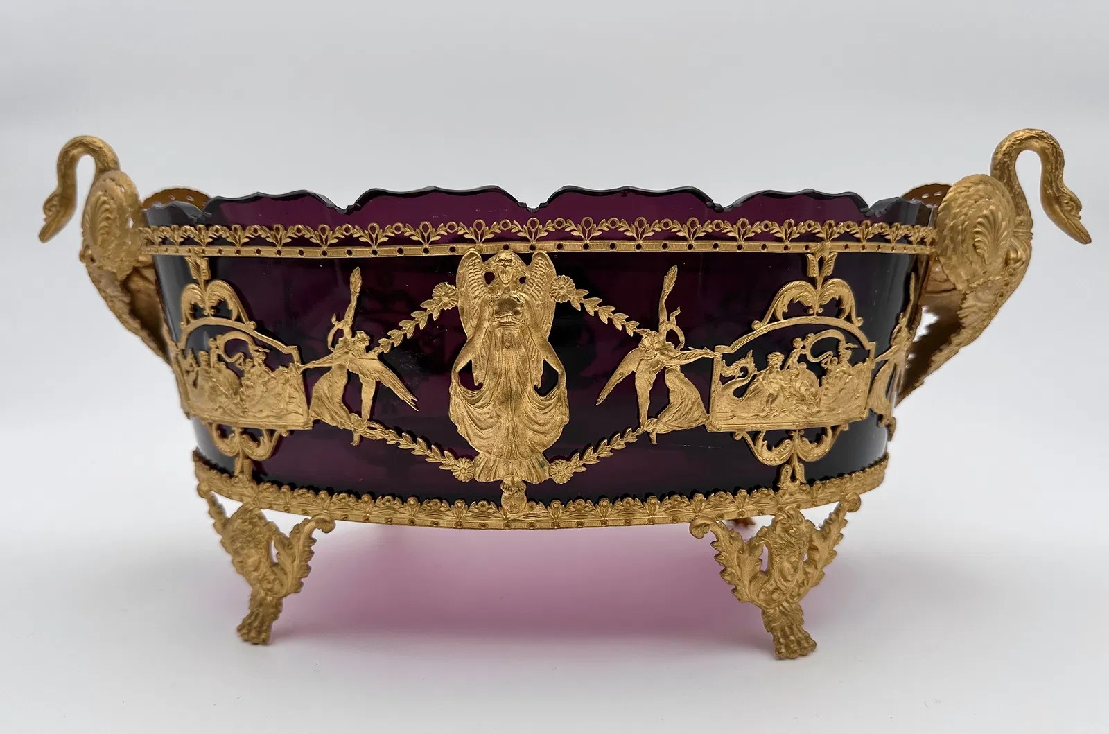 French Napoleon III amethyst-glass jardinière with gilt-bronze swan handles and lion-paw feet