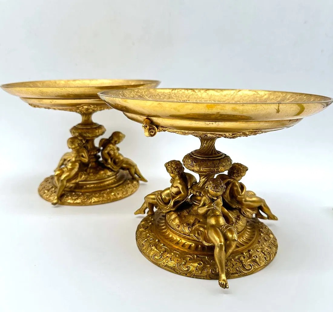 Pair of French gilt-bronze tazzas with winged putti, in the manner of Ferdinand Barbedienne