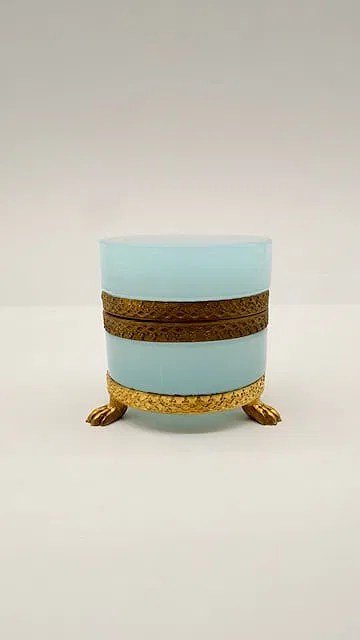 French pale blue opaline glass box with gilt mounts and lion-paw feet