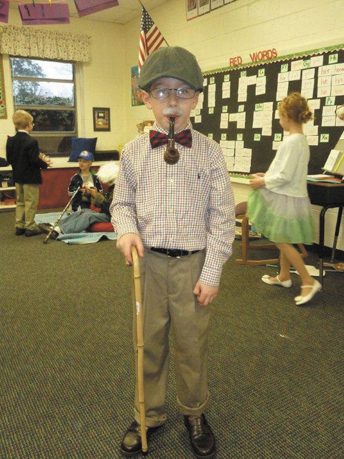 Zachary Daniels sports a pipe and bow tie.