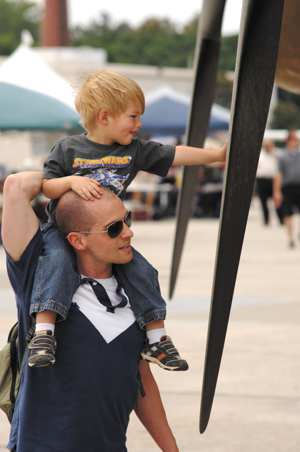 Nick Aliffi, a former member of the US Marine Corps, gives son Jack, 2, a bird’s-eye view of a plane.