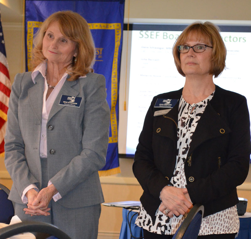 Sandy Springs Education Force executive director Irene Schweiger, left, and chairwoman Julia Bernath address members of the Rotary Club of Sandy Springs on Feb. 24.