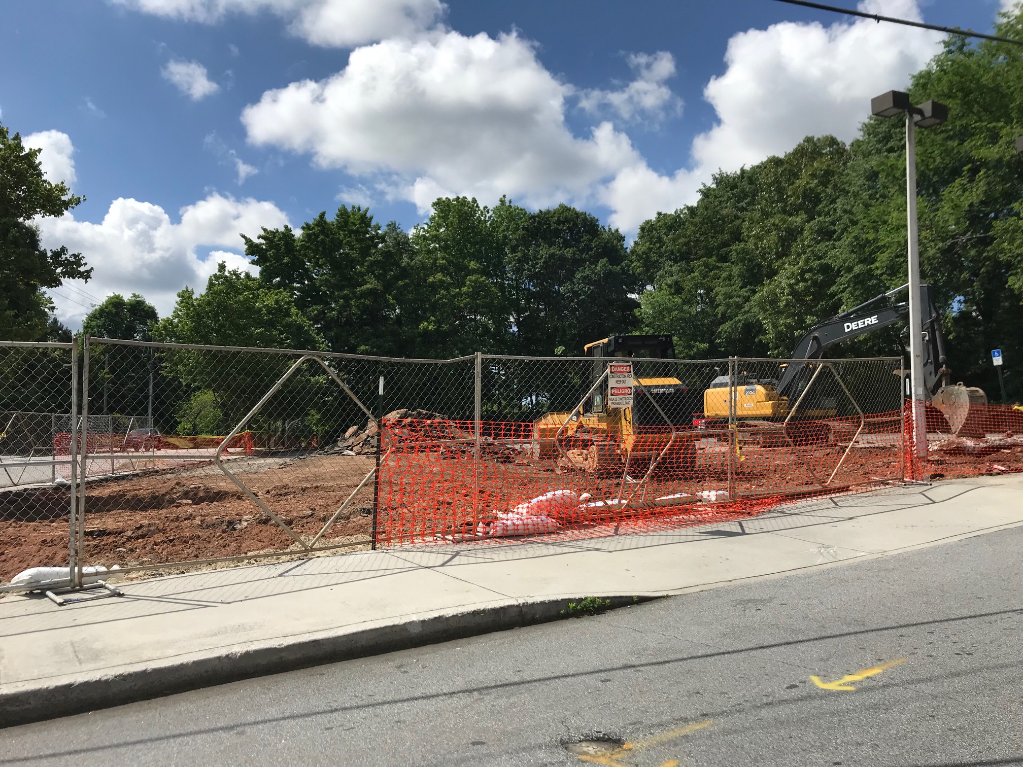 The former Manuel's Tavern parking lot at North Highland and Williams Mill Road is already a construction site.
