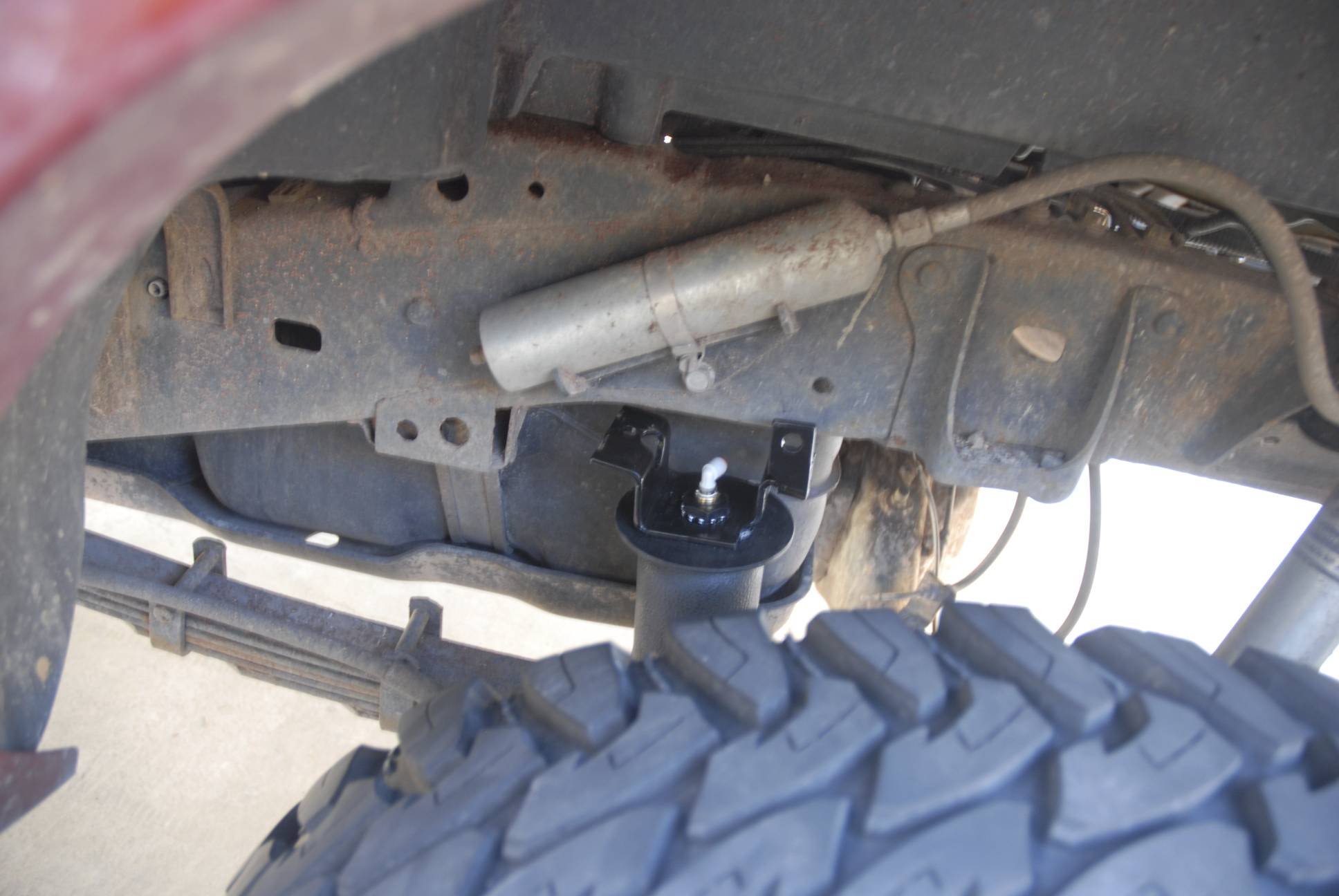 One nice feature: the valve at the top of the bag is designed to rotate 360 degrees even after the valve itself is installed, so you can bolt the assemblies in without having to commit to a particular air line route.