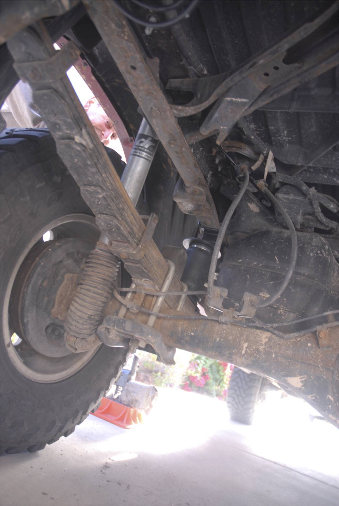 Dad peering down at me. I have the assembly in place and really, the hardest part here was getting a spanner onto the lock nuts inside the frame channel. Fiddly, but not difficult.