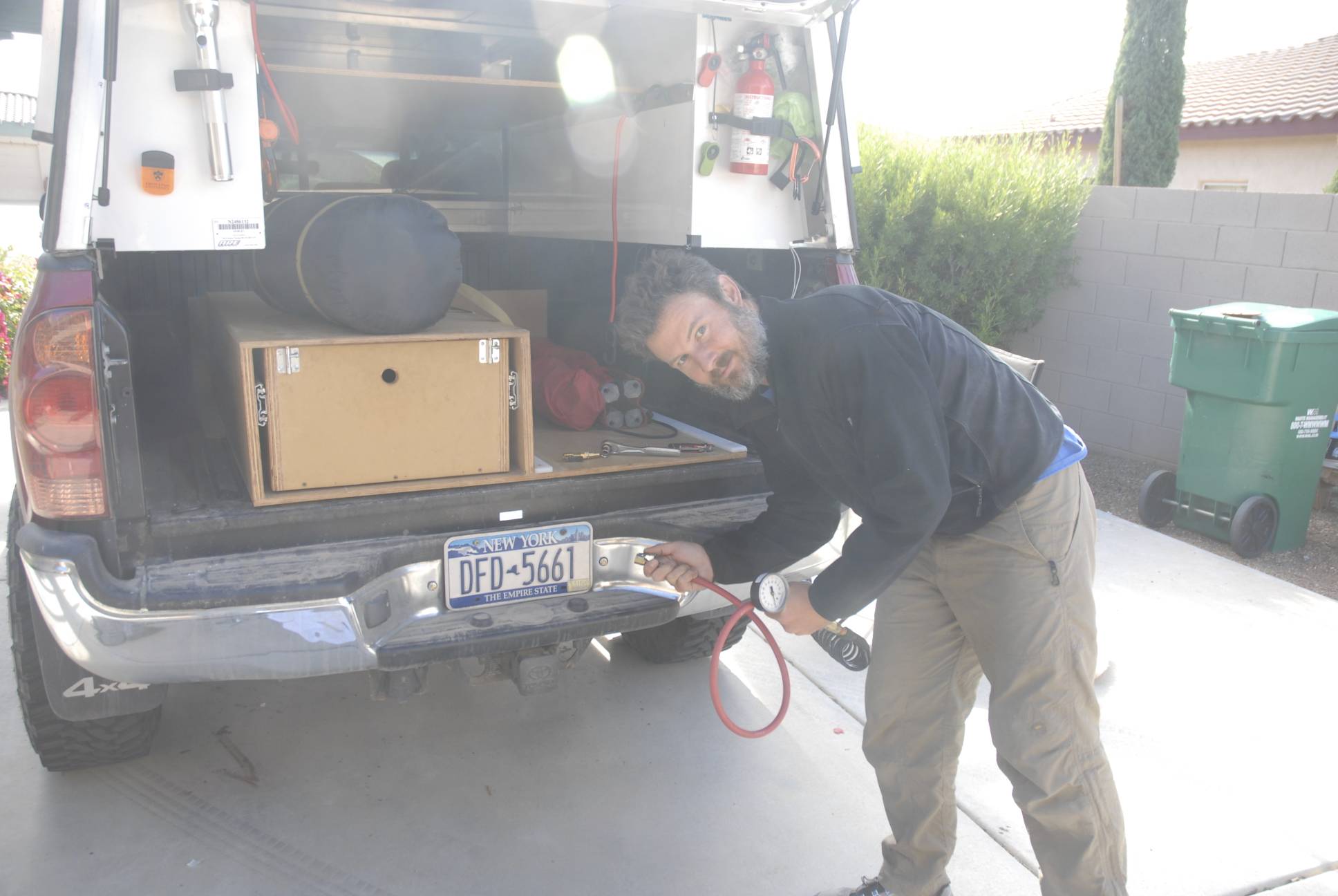 A 5/16 drillbit later, I have the valves for each bag installed, neatly, on either side of the license plate at the rear bumper. Filling them up for the first time, so fingers are crossed here.