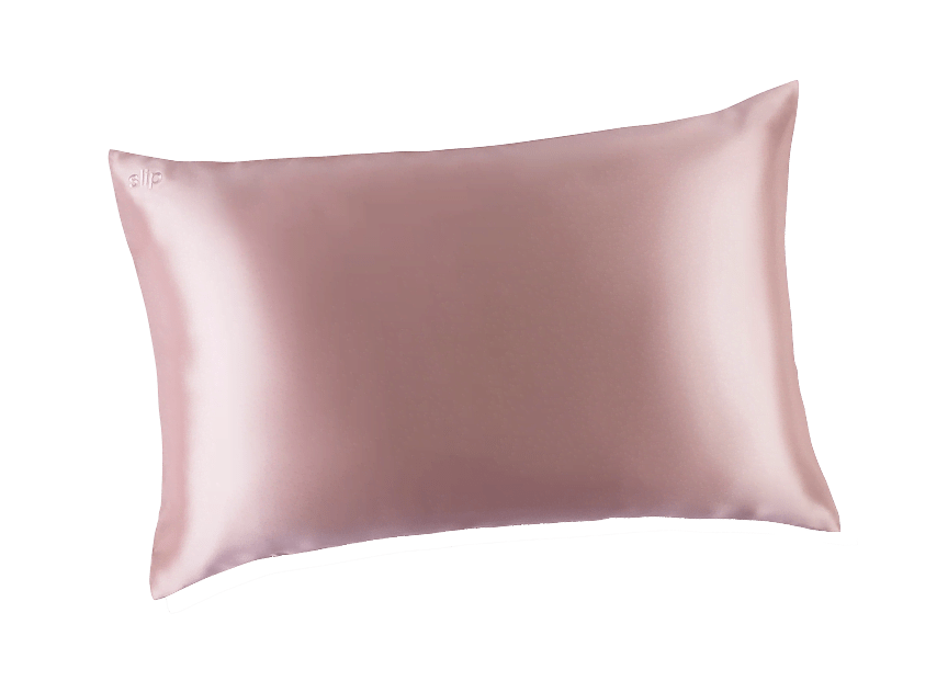 A pink silk bed pillow