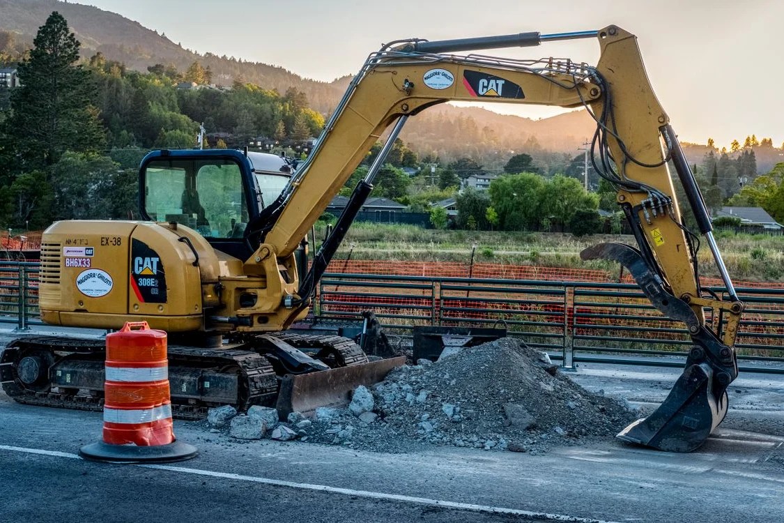 Excavator at a road construction site