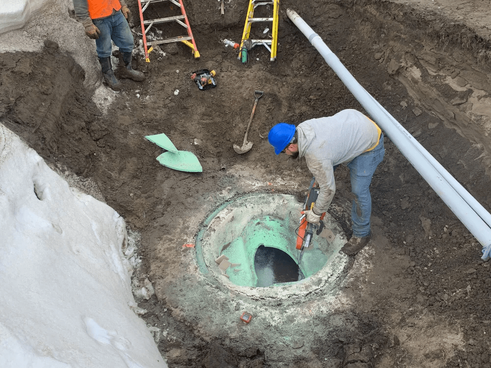 Man+working+on+a+hole