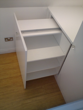 Side access shelves using a pullout sliding system