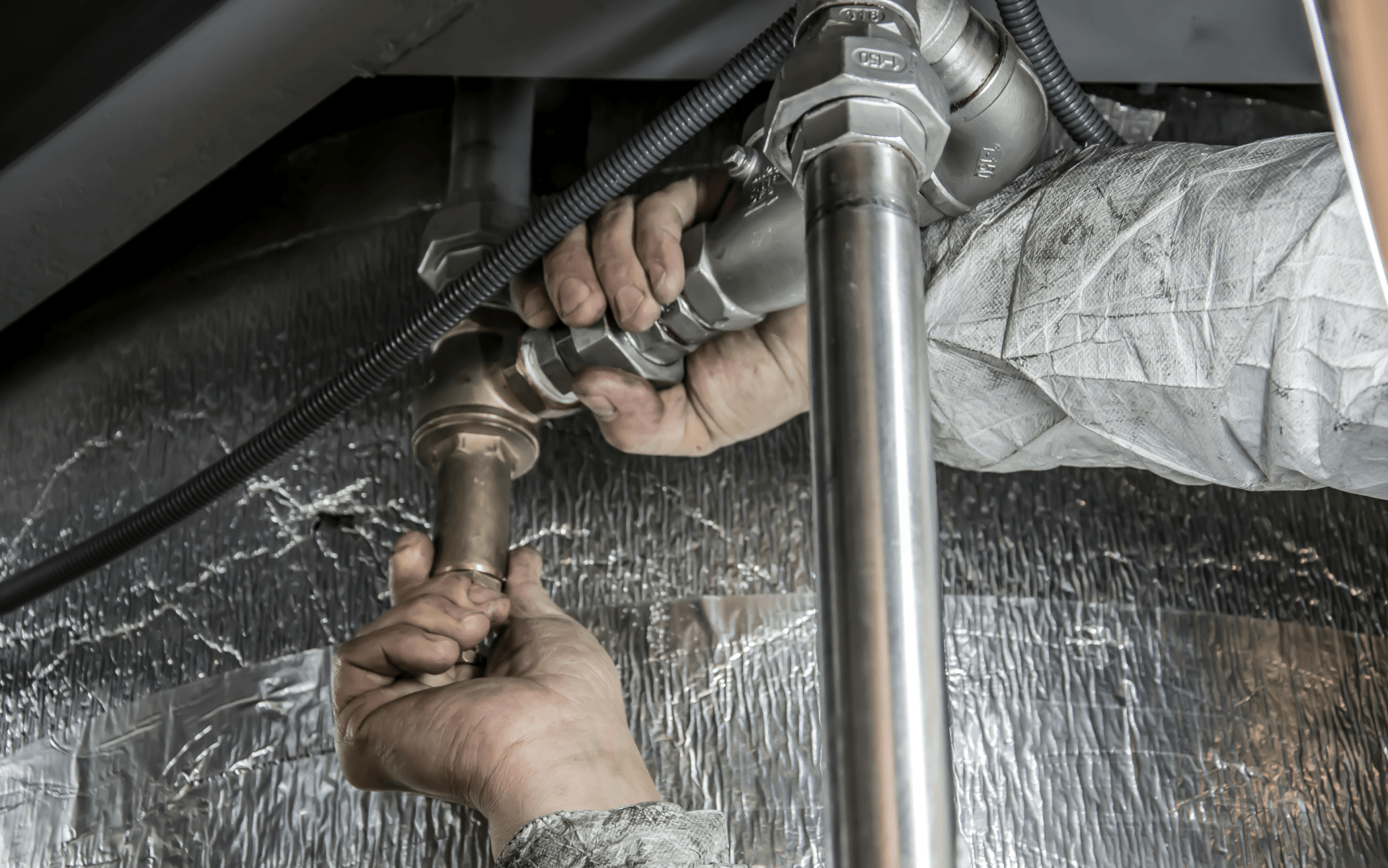 General contractors in New Jersey managing a full home renovation project by fixing drainage lines.