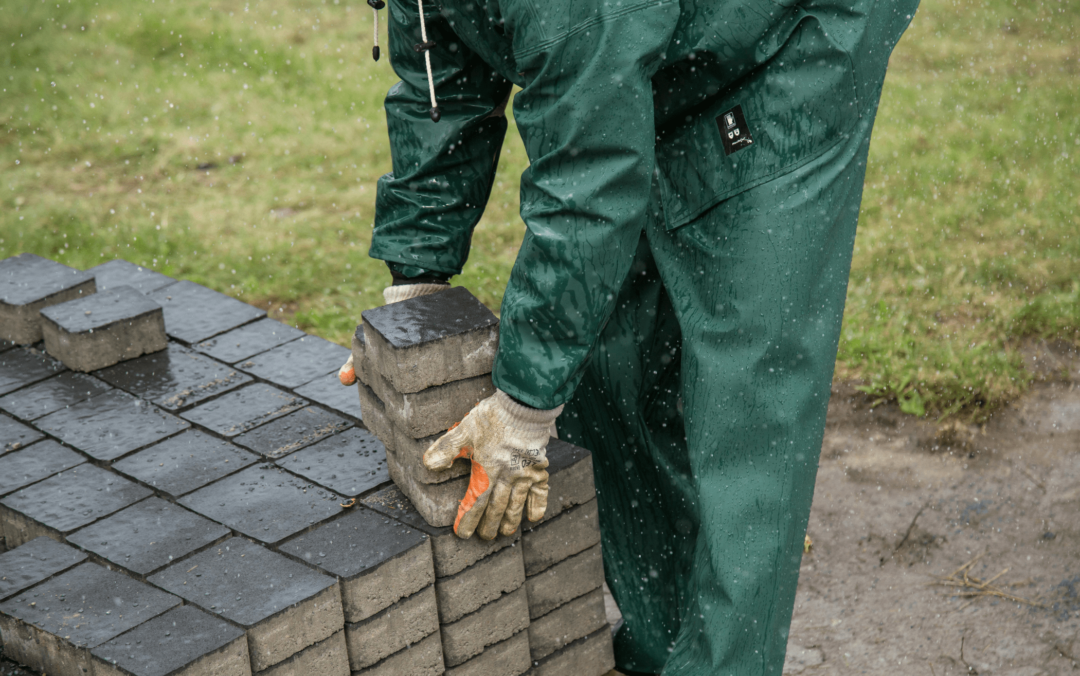 Paver preparation for masonry work of a New Jersey home.