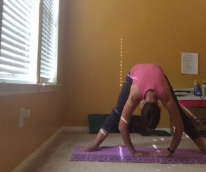 wide legged forward fold - yoga poses for runners