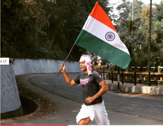 Milind Soman celebrates 72nd Republic Day by running barefoot holding India's national flag; says 'The power is with the people' 1