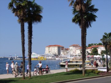 Poreč quayside with the Grand Hotel Palazzo in the distance