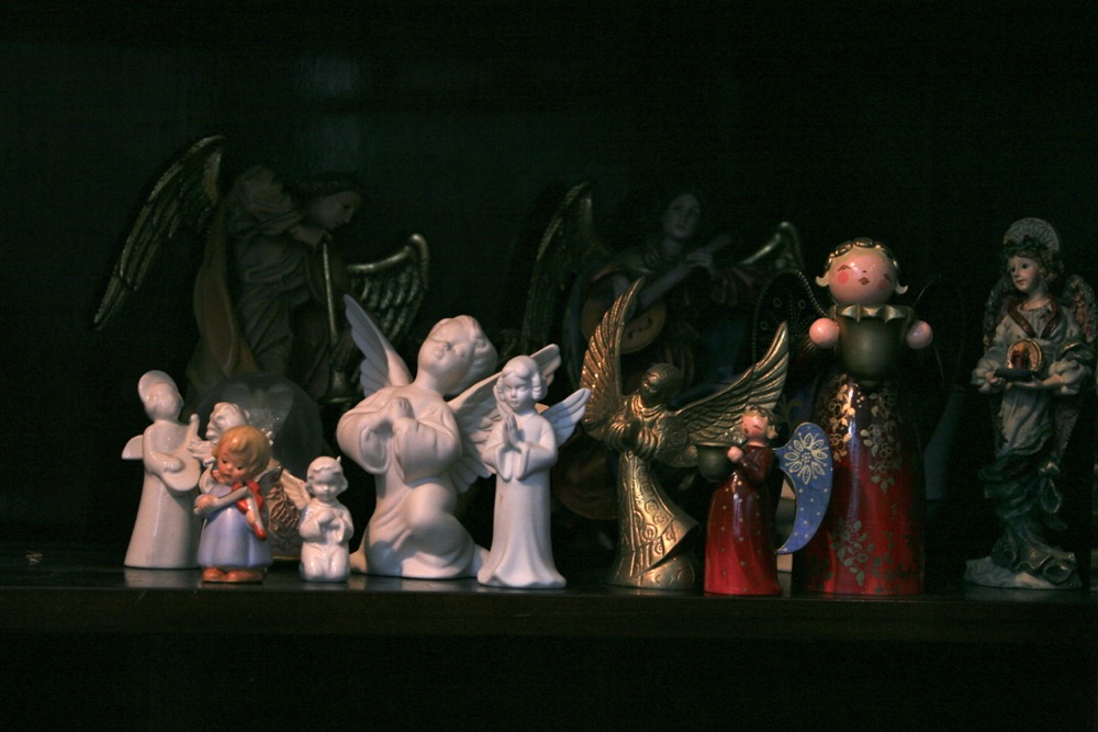 2009- from the archivesThese angels are on a shelf in one of the built in china closets in the dining room.