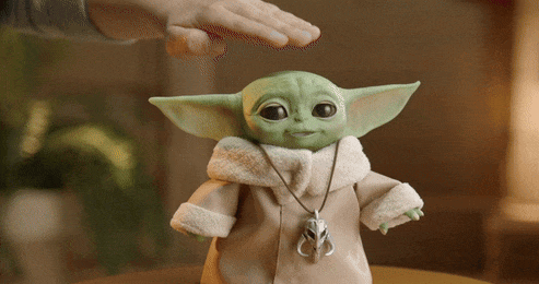 Gif of the Mandalorian baby Yoda toy.