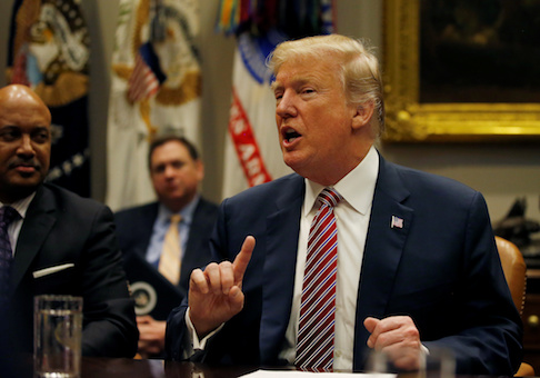 Trump meets with local and state officials about improving school safety at the White House in Washington