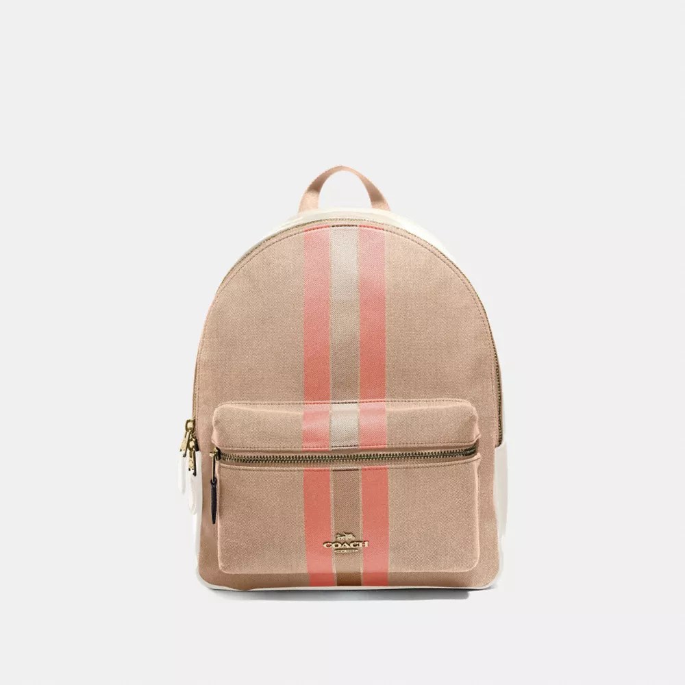 Black signature jacquard and refined pebble leather with varsity stripe . Coach F73158 Medium Charlie Backpack In Signature Jacquard With Varsity Stripe Light Khaki Coral Gold Coach Handbags