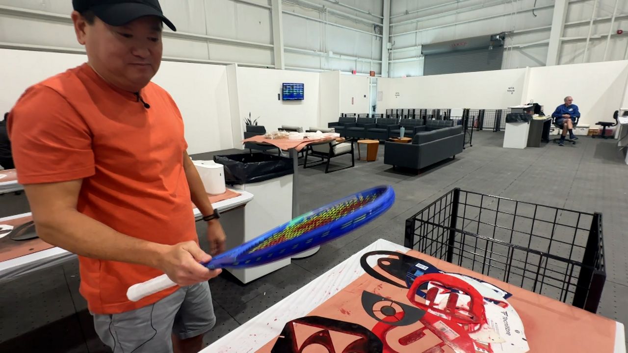 Tennis racket stringers keep Cincinnati Open going