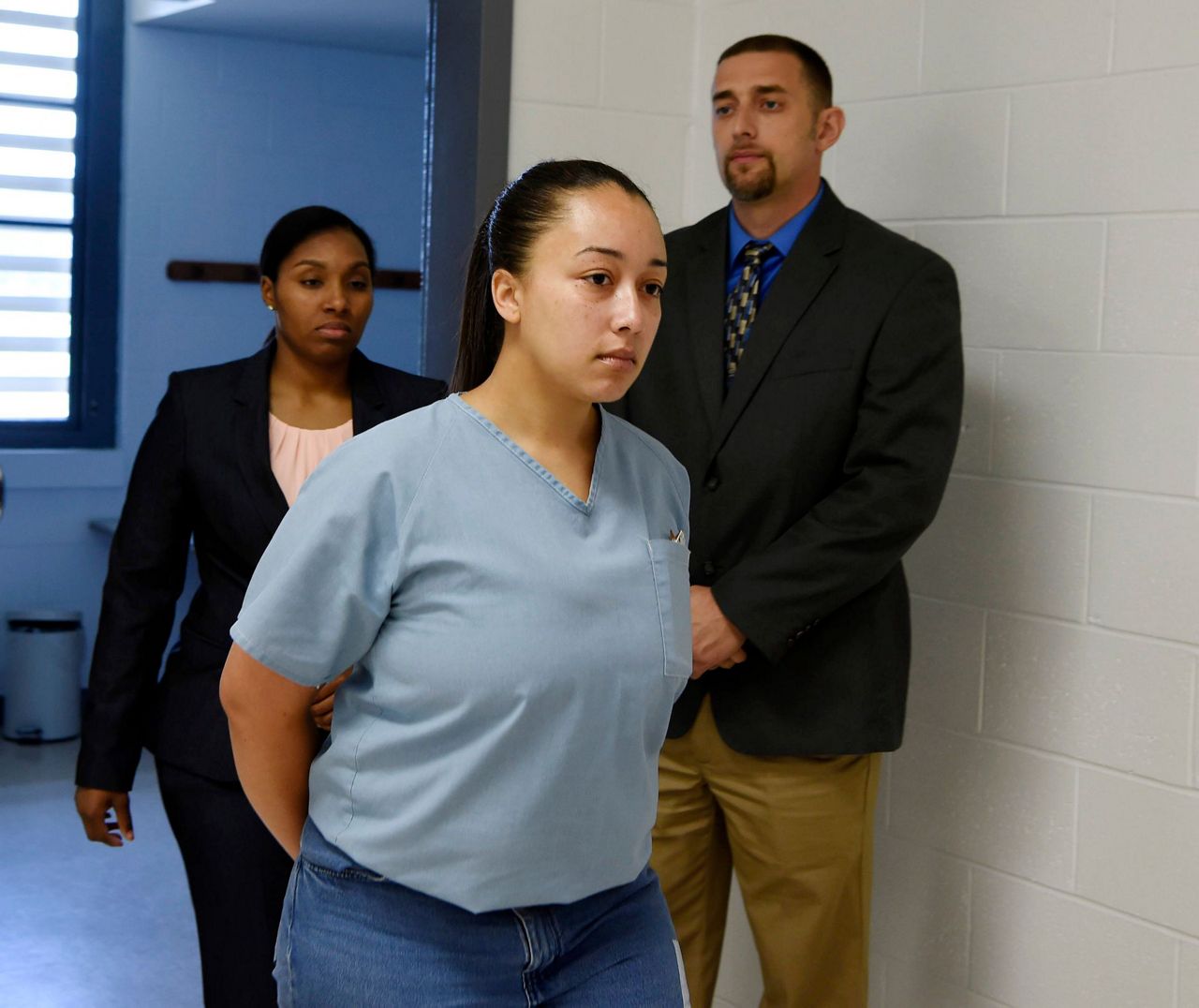 Woman sentenced to life as teen in killing wins clemency