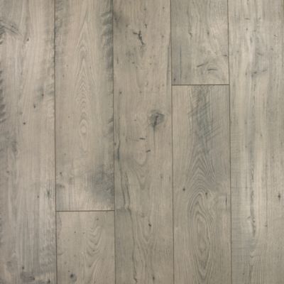 Vinyl and laminate flooring are two popular options for home remodeling projects. Mohawk Industries Rustic Vision Silverstone Chestnut