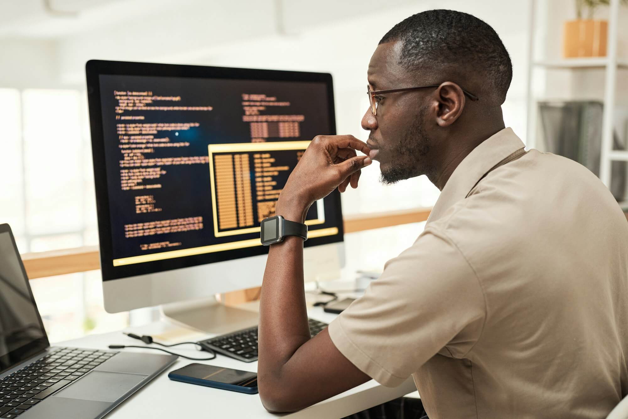 software-engineer-reading-programming-code.jpg