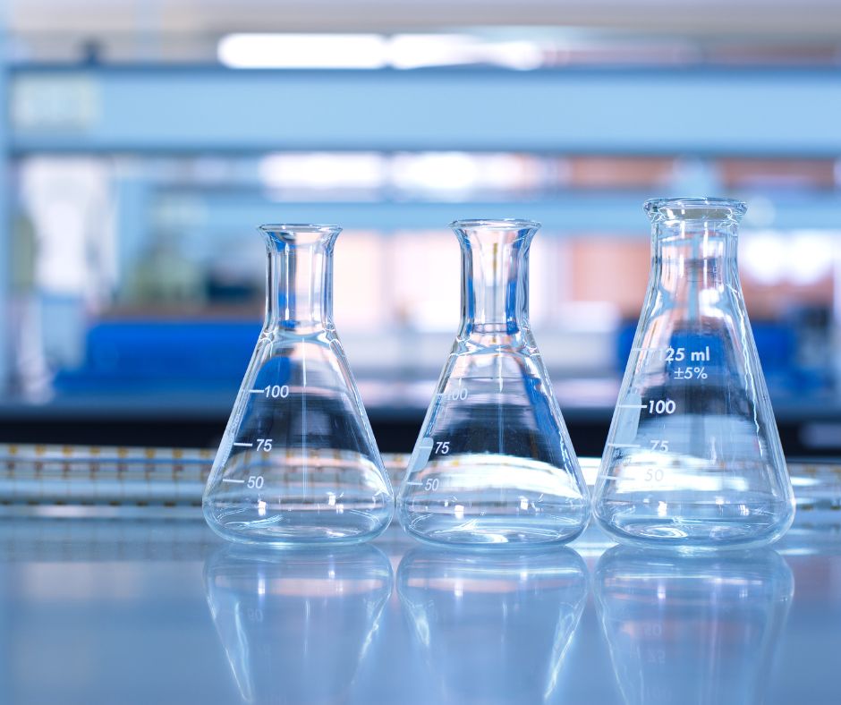 Three Erlenmeyer Flacks on a lab Bench