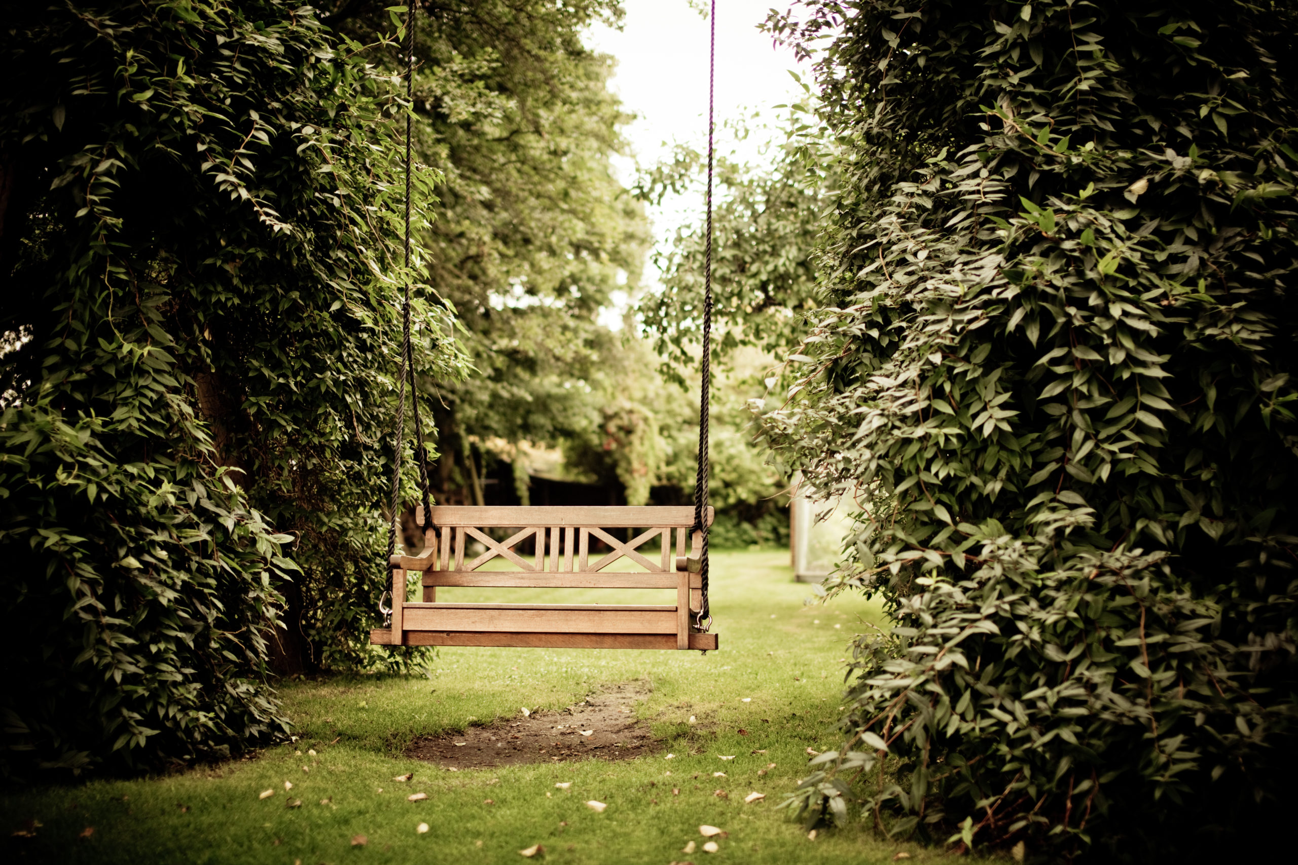 An empty bench swing