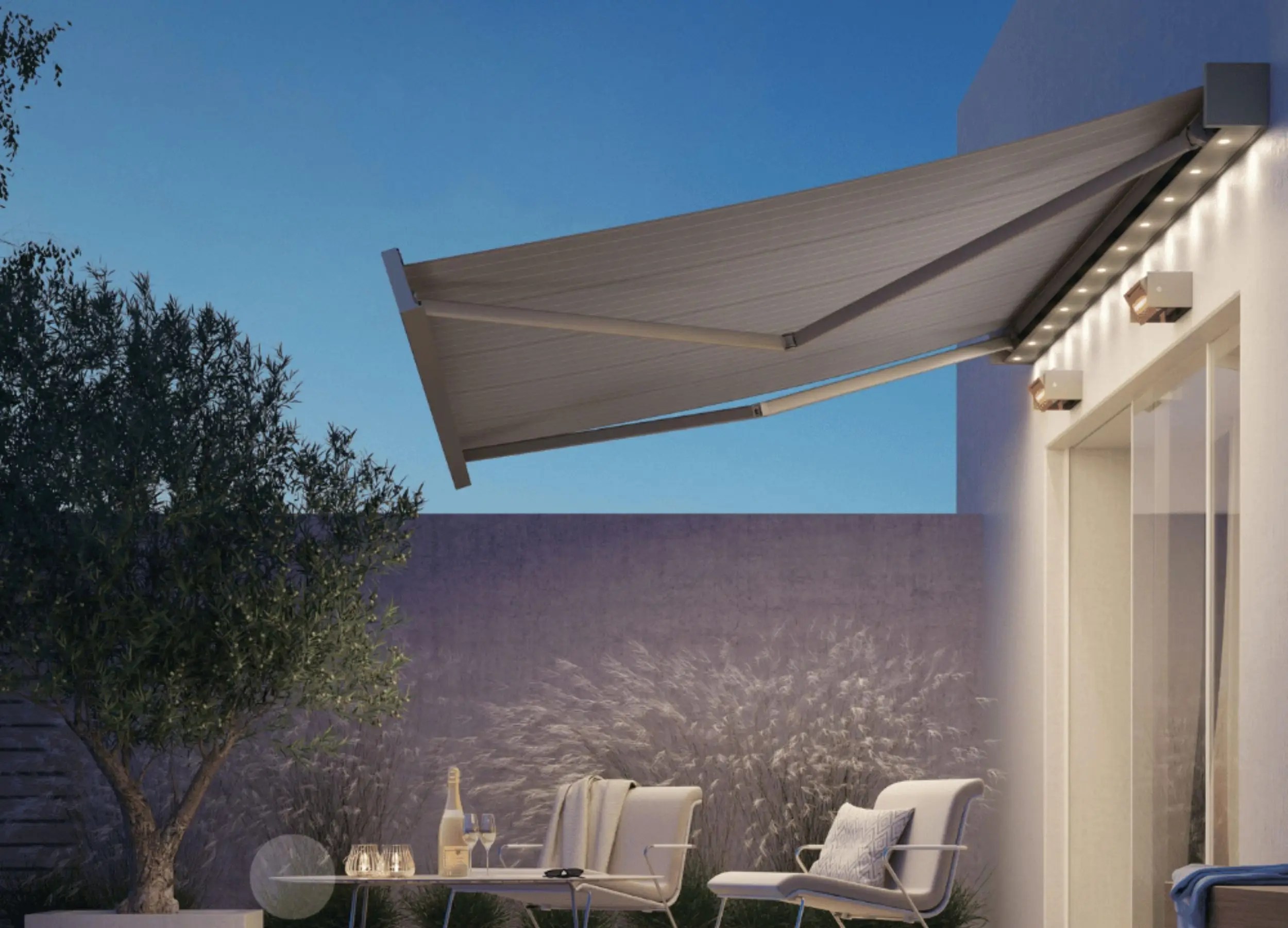 Kubata full-cassette awning fully extended over patio seating