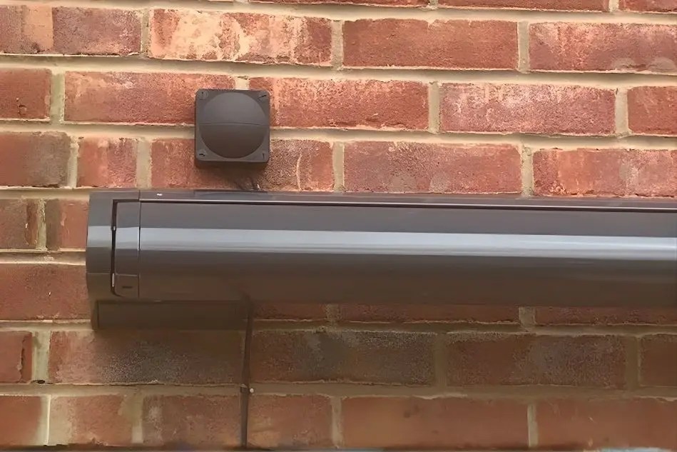 Close-up of Weinor awning cassette fixed to brickwork