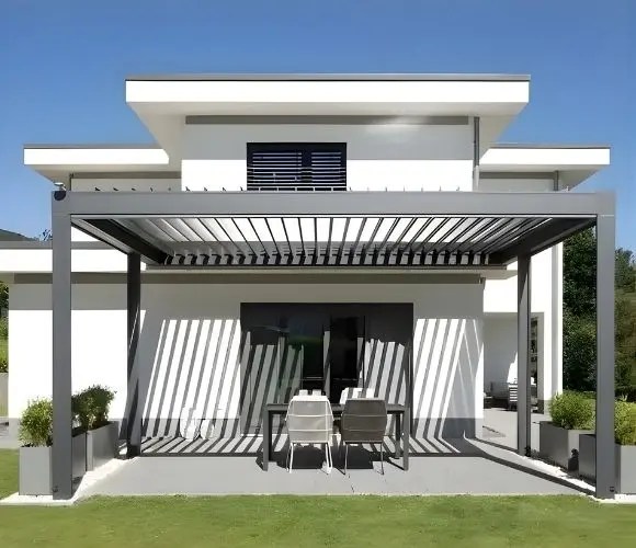 Modern pergola with louvred roof installed in a garden in Essex, Suffolk and Cambridgeshire by Saffron Outdoor Living