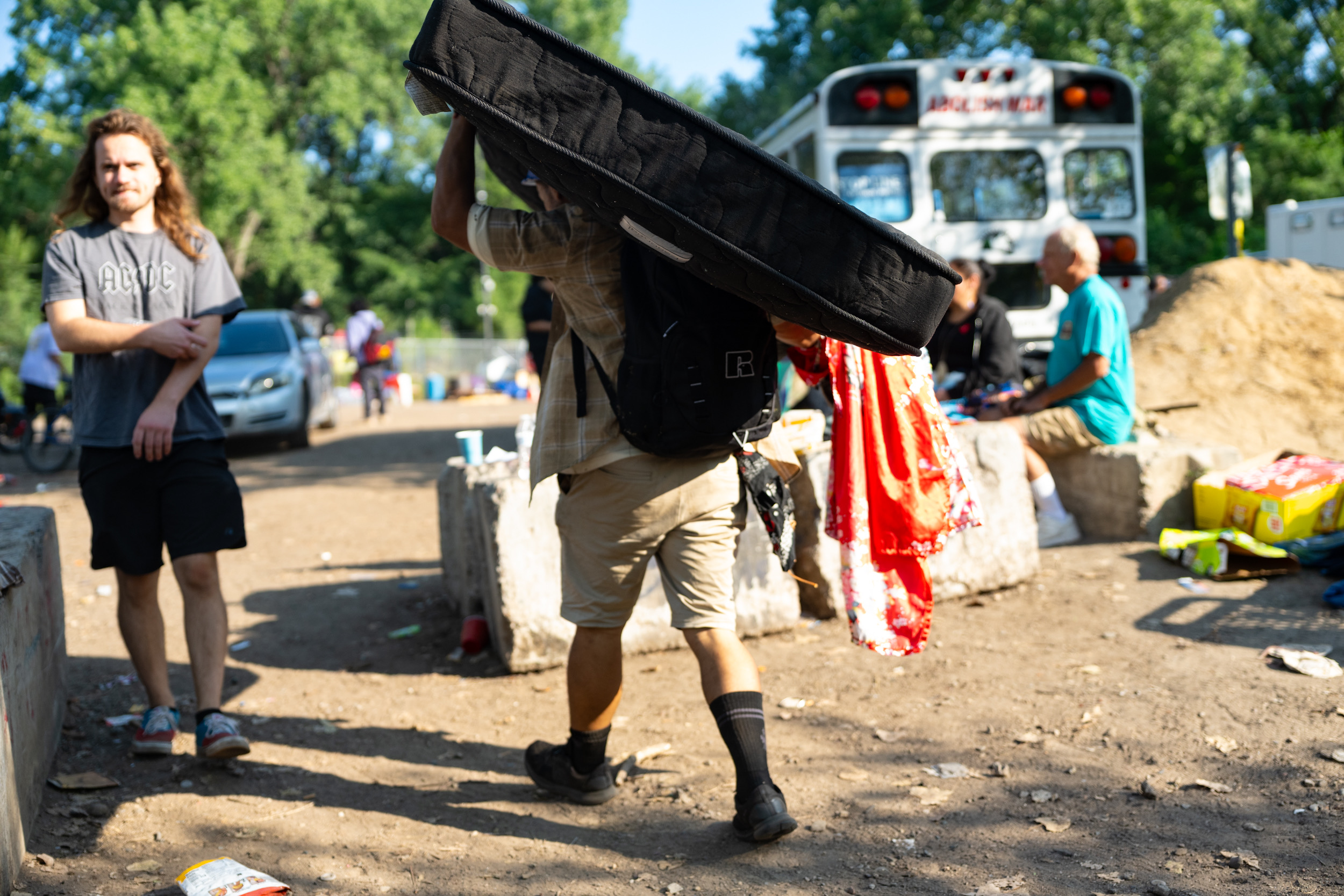 St. Paul crews move to clear Pig’s Eye encampment, leading to tense moments with volunteers