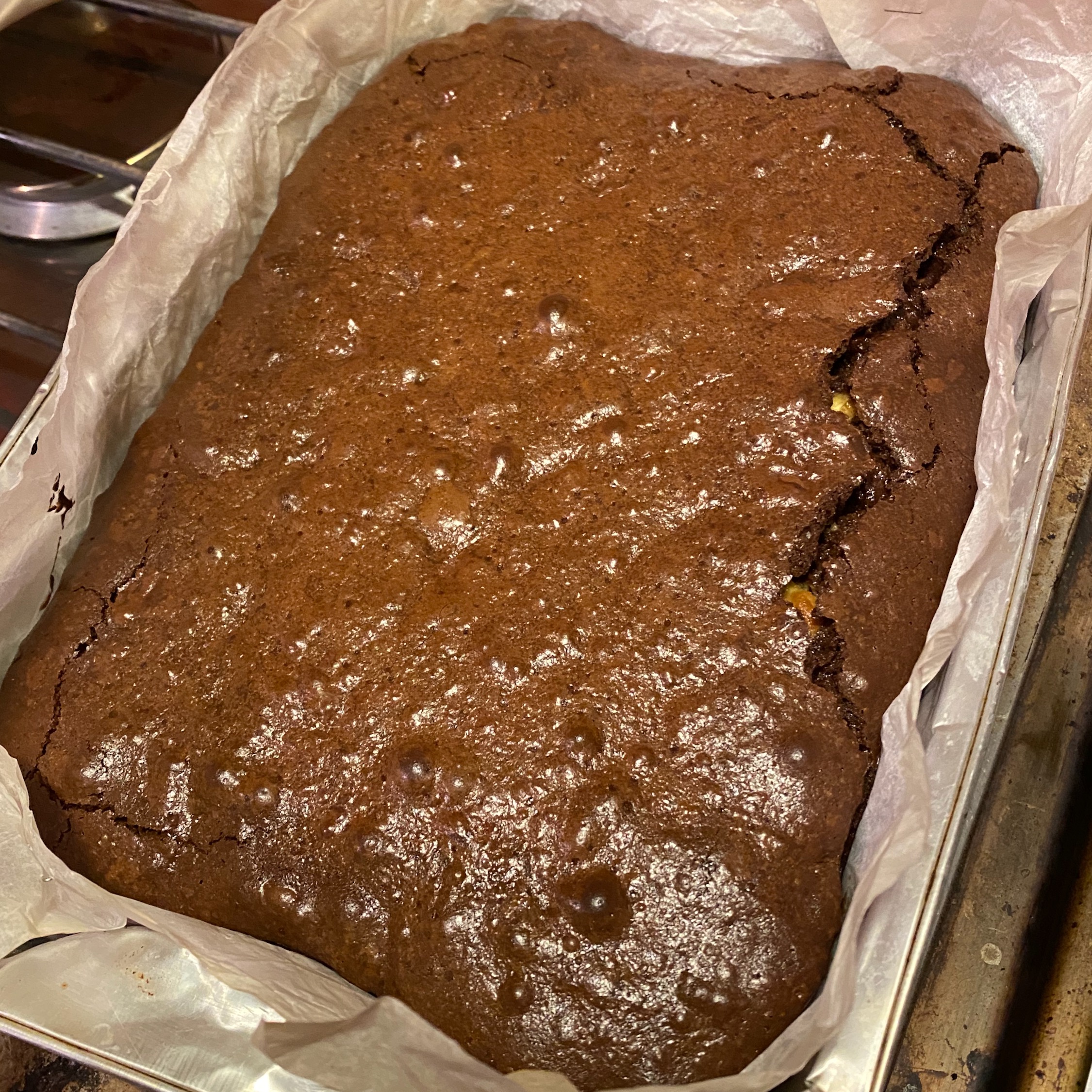 Triple chocolate fudge brownies made with milk, white and dark chocolate and baked until gooey in the centre with a crispy top.