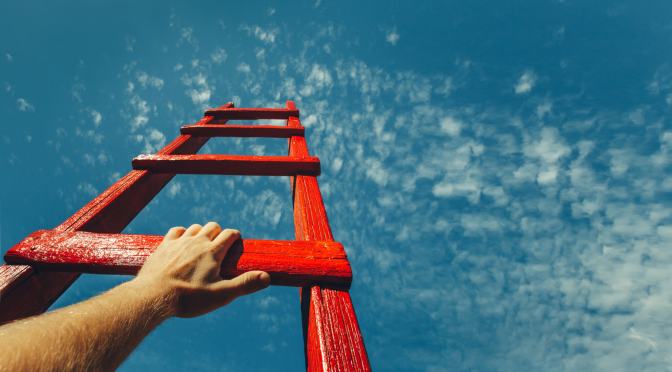 a ladder reaching into the sky