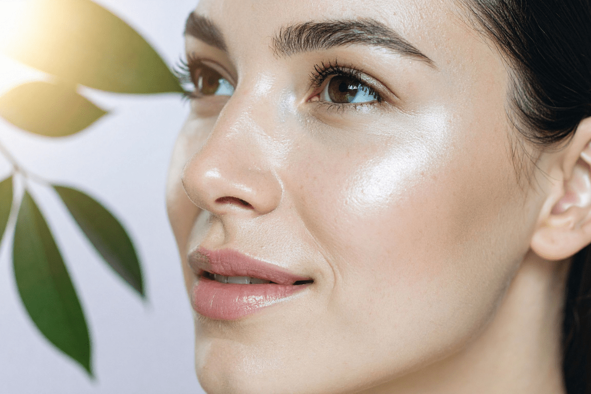 Close-up of a woman with radiant, dewy skin, demonstrating how hydro facials create a real glow and deep hydration.